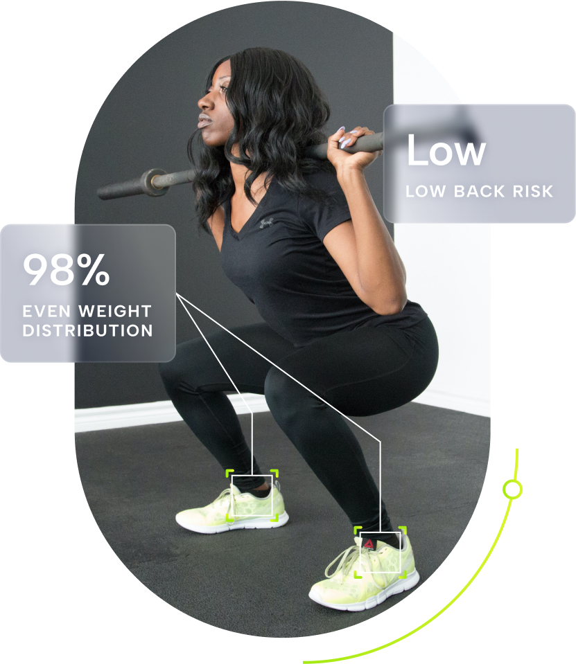 A woman squatting with a resistance band in her hands.