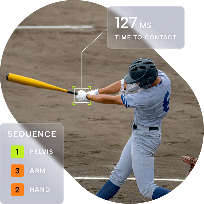 A baseball player swinging at the ball with his bat.